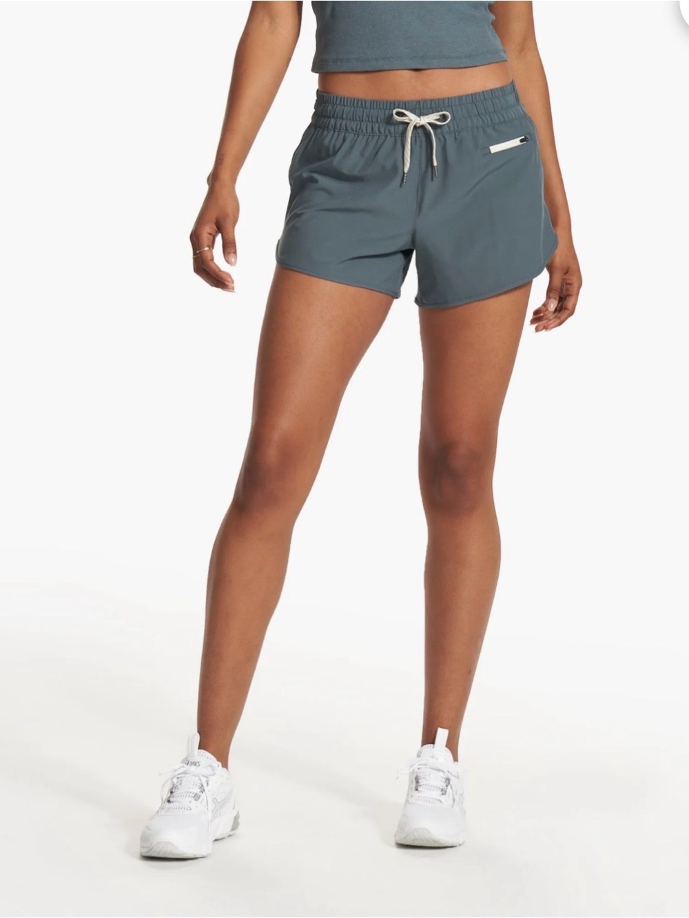 Vuori Clementine Athletic Shorts in the color Lake. 2 inches.